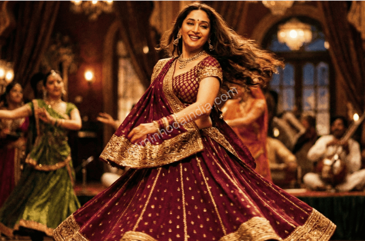 Madhuri Dixit em cena de Bollywood, conhecida por sua dança graciosa e atuação marcante